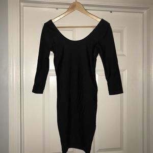 Cuts low in the back and fits slim.